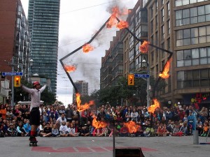 "Fireboy, a Busker in Toronto Buskerfest 2009" by Loozrboy
