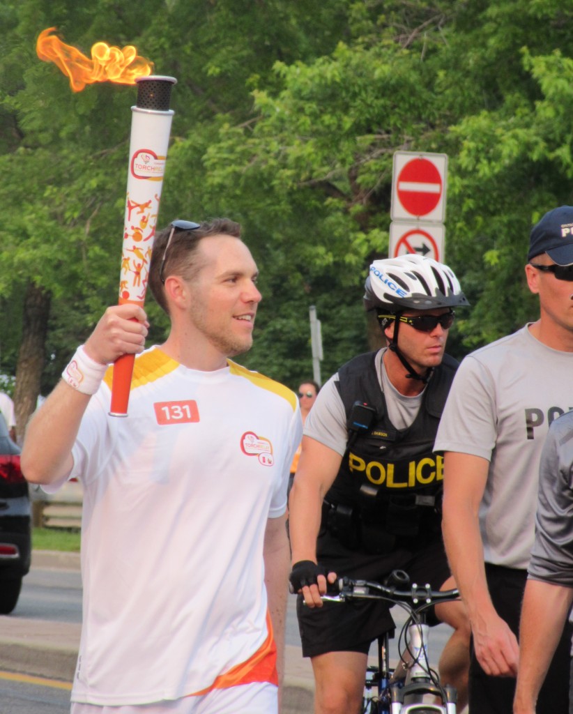 "Escort on the Left of the PanAm Torch" image (c) by Linda DeHaan